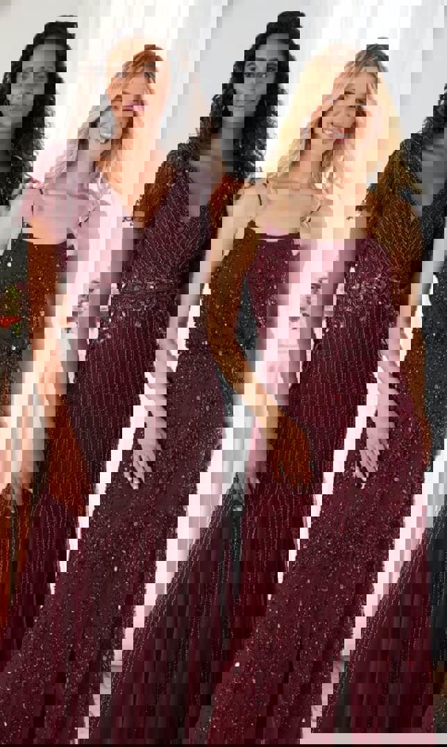 Models wearing a red dresses