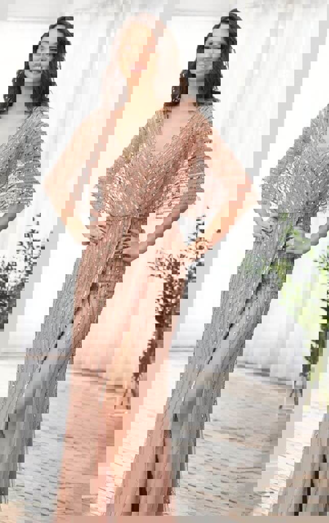 Model wearing a purple dress