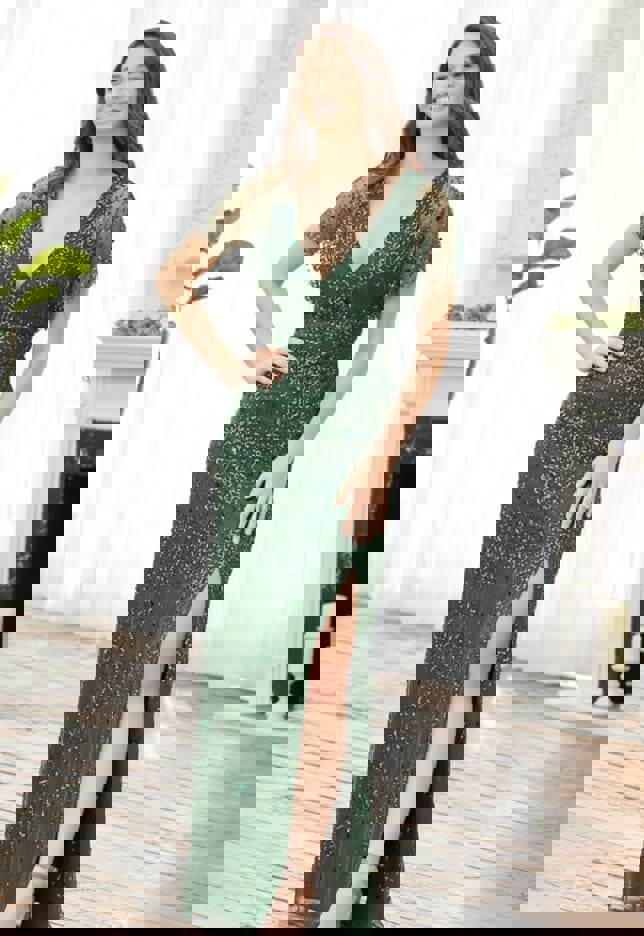 Model wearing a green dress